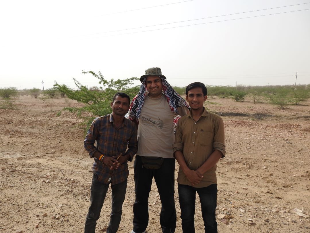 Sumit (in centre), with two local birding guides, trained by him. Photo credits: Sumit Dookia