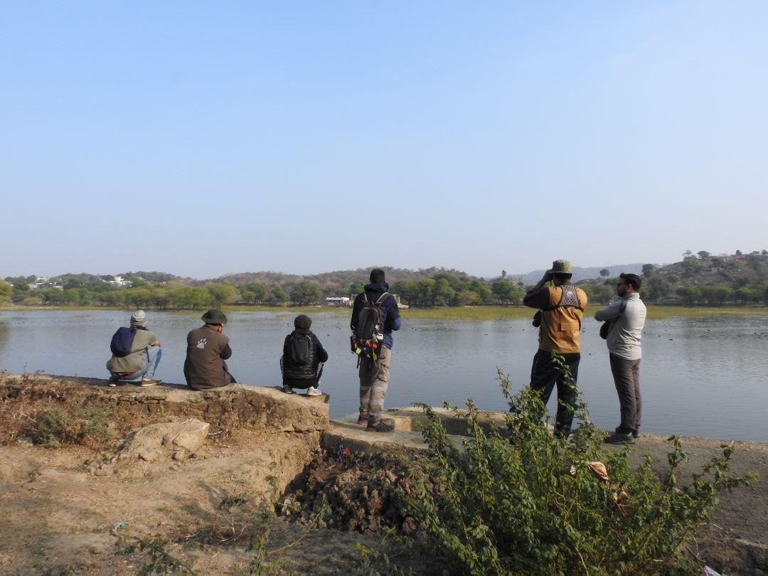 Watching birds with students during a field session. Photo credits: Sumit Dookia